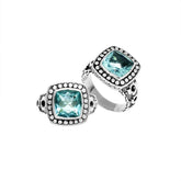 Handmade sterling silver Balinese ring with cushion-cut Blue Topaz Quartz in a dotted bezel.